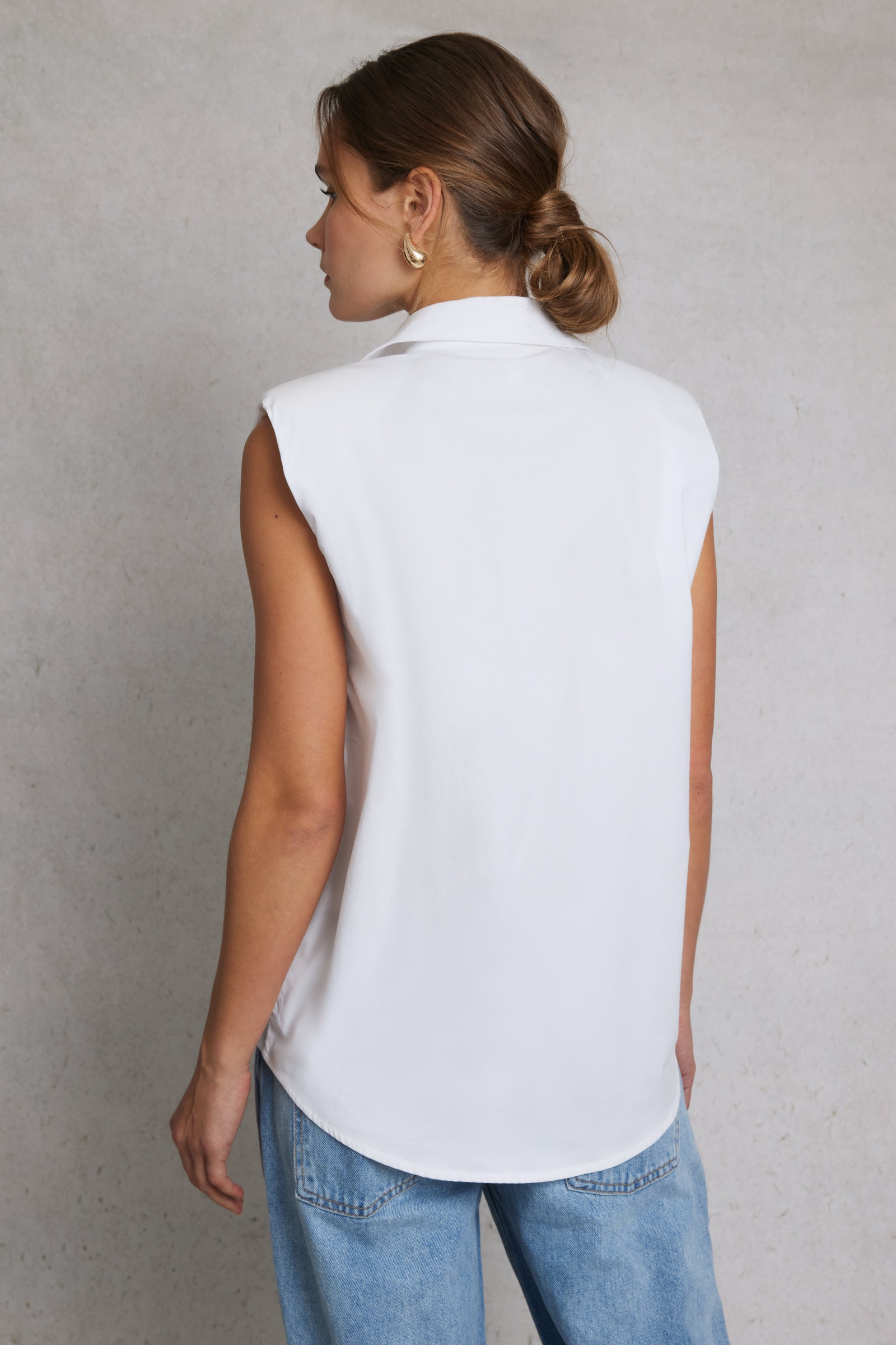 Sleeveless White Shirt